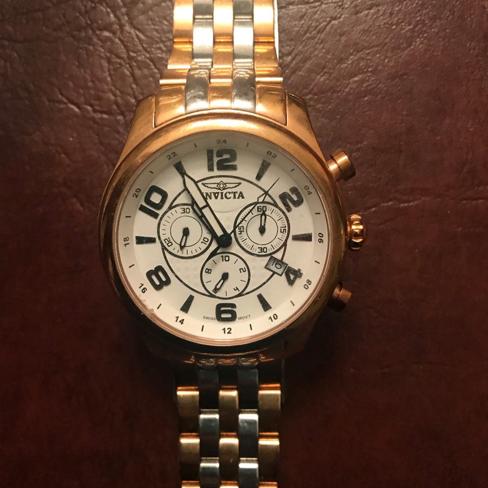 Men’s gold and silver Invicta watch